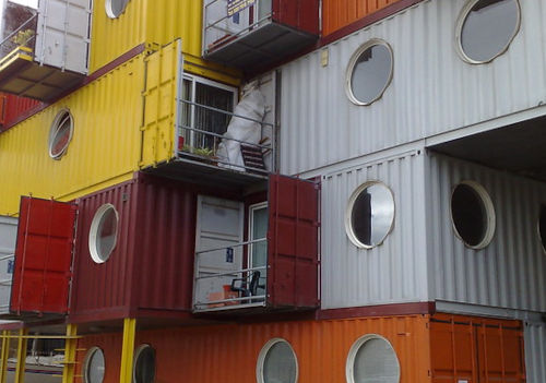 A photograph of a city made of old shipping containers.