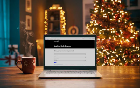 Code Enigma laptop in front of a Christmas tree